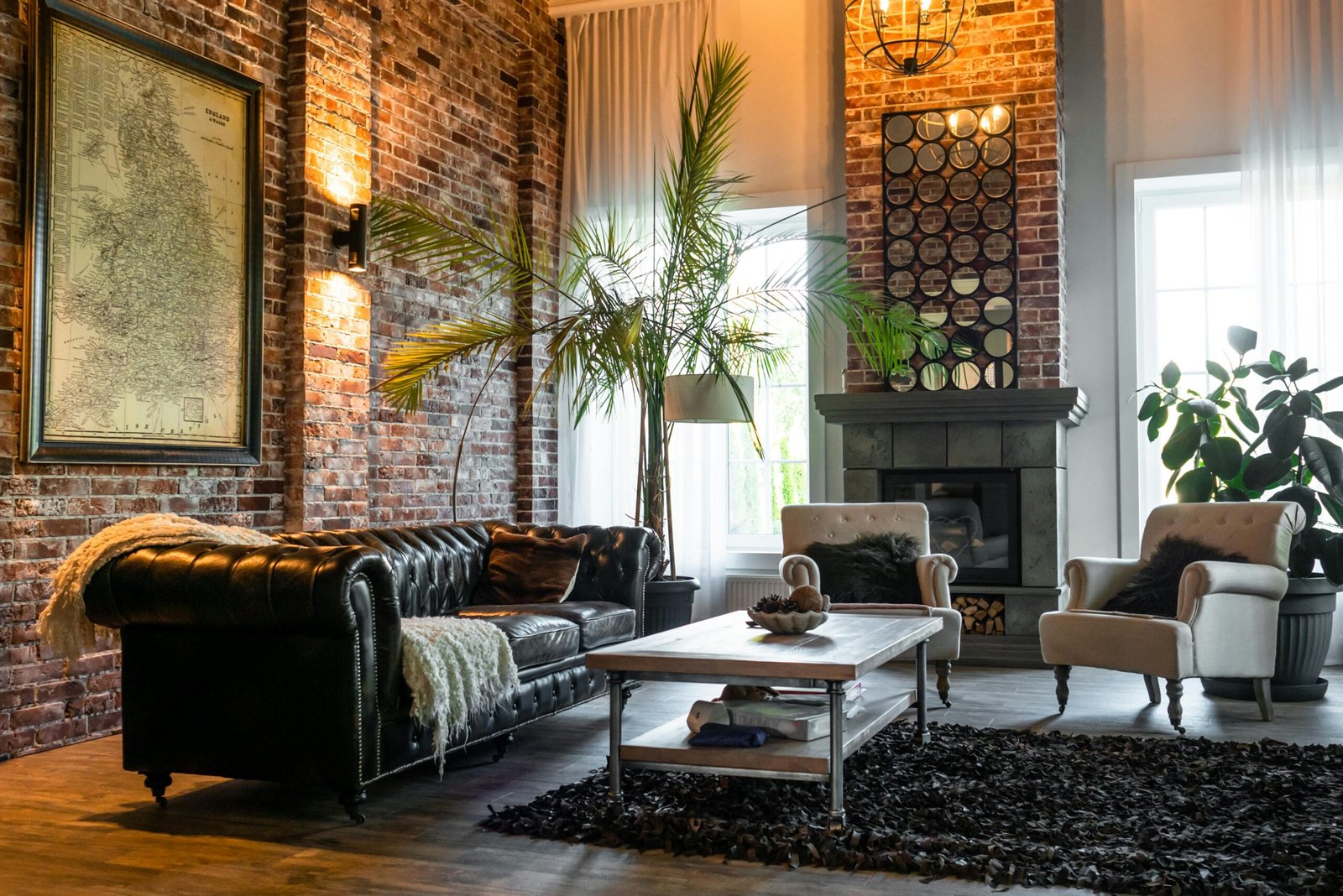 Industrial home decor with plants and brown sofa