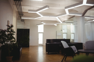 Modern living room featuring stylish wall and ceiling designs